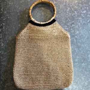 Straw Handbag with Wooden Handles.